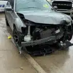 Front damage to the Chrysler 300 after the Dallas collision